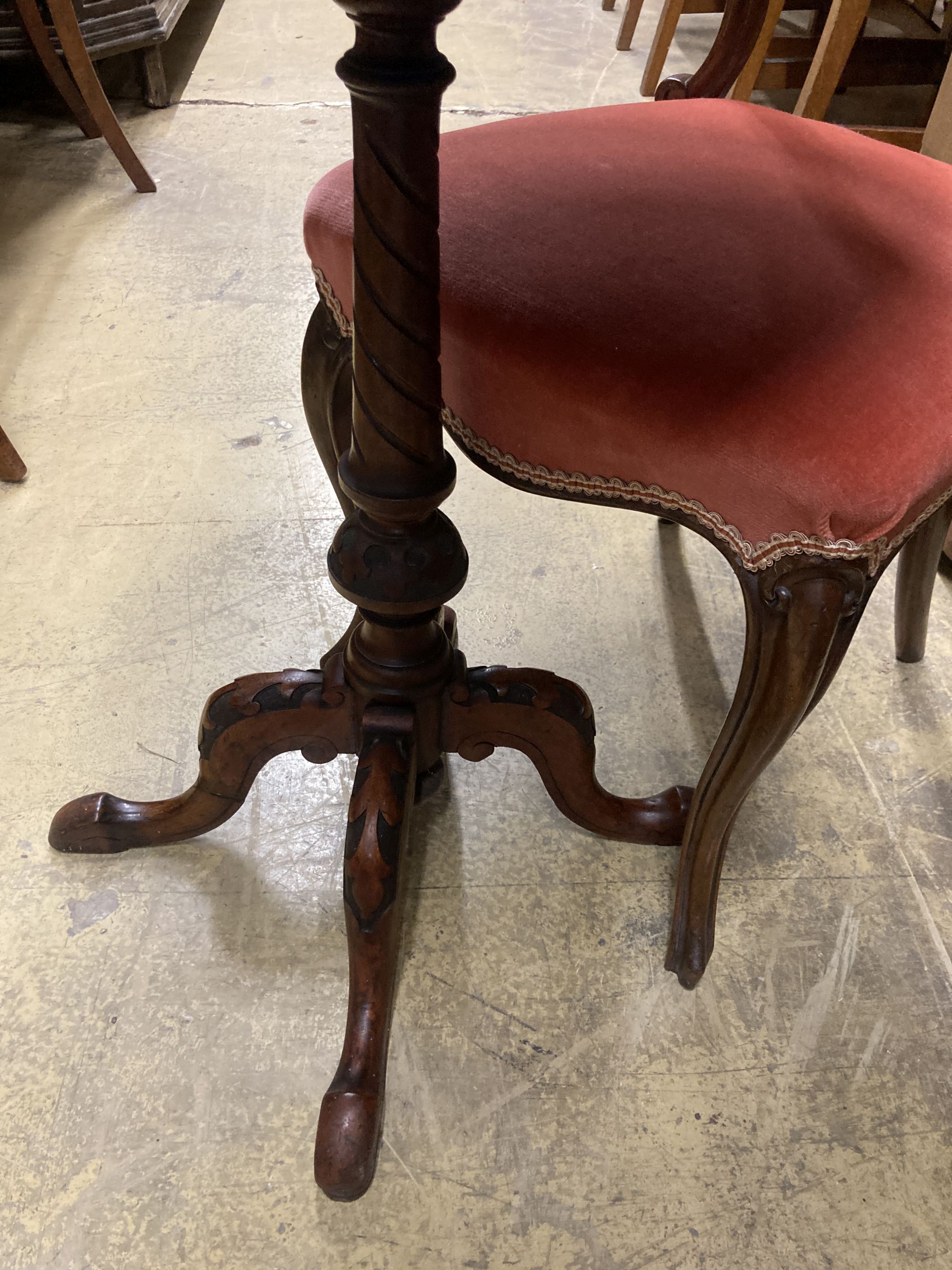 A Victorian oval tripod table, width 68cm, depth 52cm, height 72cm together with four Victorian spoon back dining chairs (three plus one)